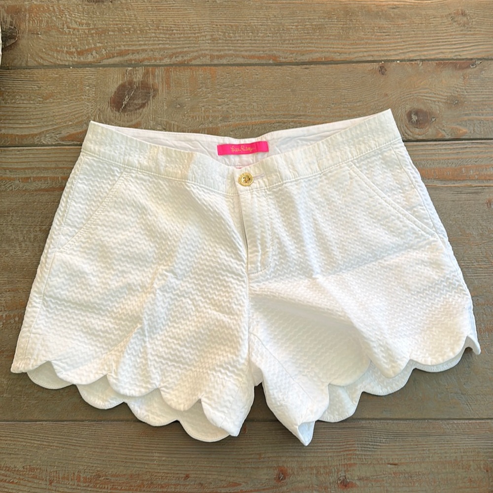 White scalloped shorts